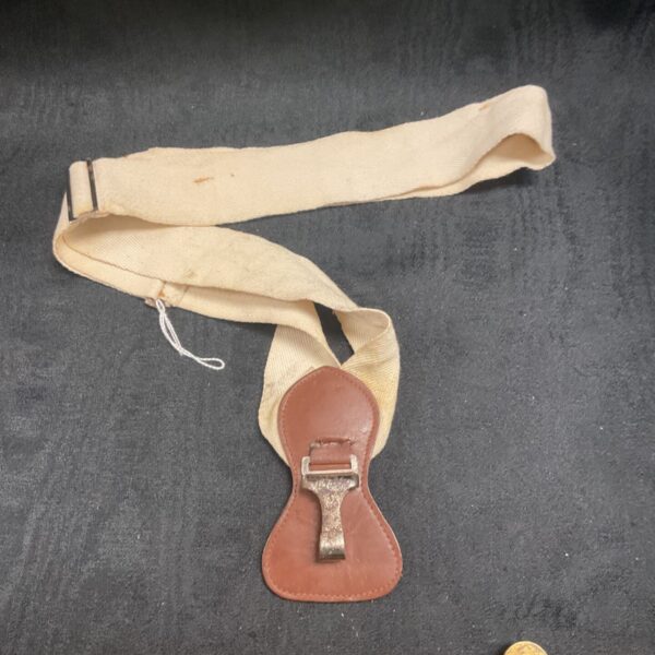 WWII German dagger carrier made of dark brown leather.
