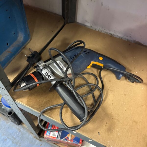 GMC 8920 hammer drill, a corded power tool for DIY projects.
