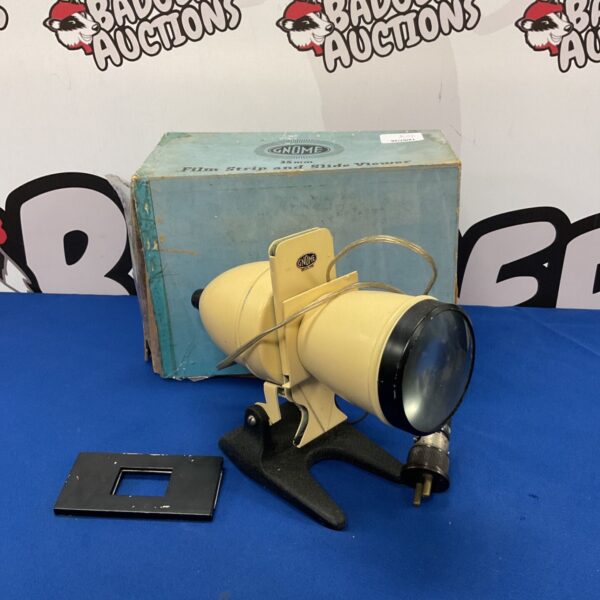 Vintage Gnome 35mm film viewer for slides and film strips.