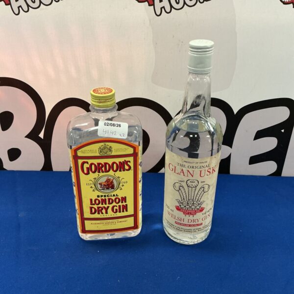 Vintage Gordon’s and Glan Usk gin bottles, collectible spirit bottles.