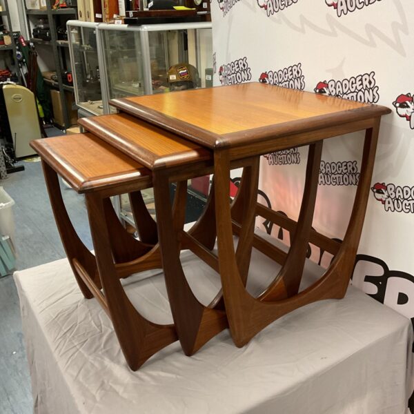 Gplan mid century teak nest of tables in a room setting.