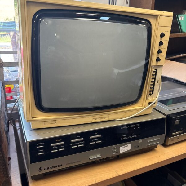 Vintage Granada VHS player and Ferguson CRT television set.