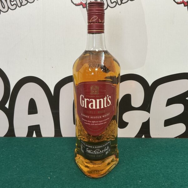 Bottle of Grants Triple Wood blended Scotch whiskey.