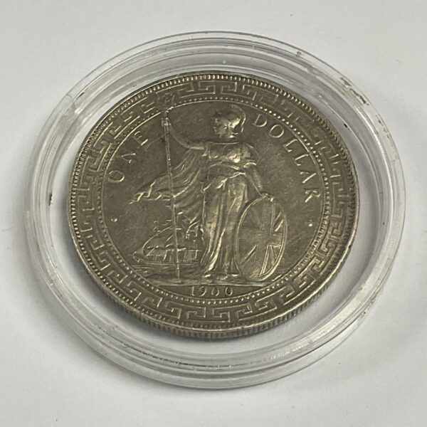 1900 Great Britain China Trade Dollar silver coin in holder.