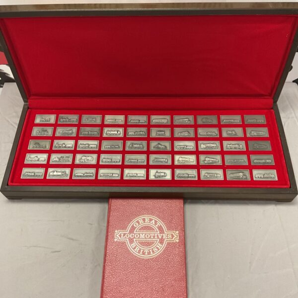 Complete set of Great British Locomotive pewter ingots in display case.