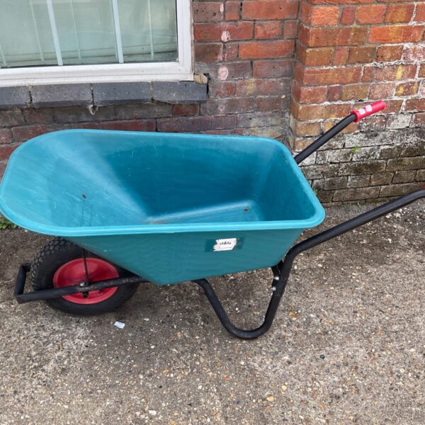 Green plastic wheelbarrow with a single red wheel for garden use.
