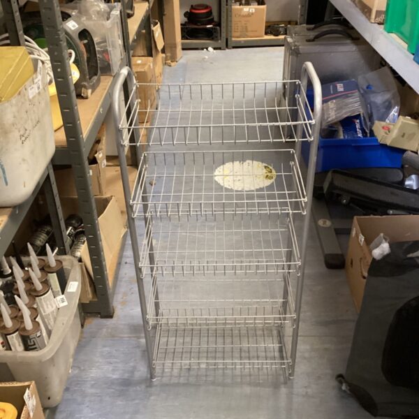 Grey wire shoe rack with four tiers for organized shoe storage.