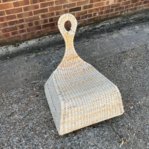 Vintage Gullholmen rocking chair made of woven rattan.