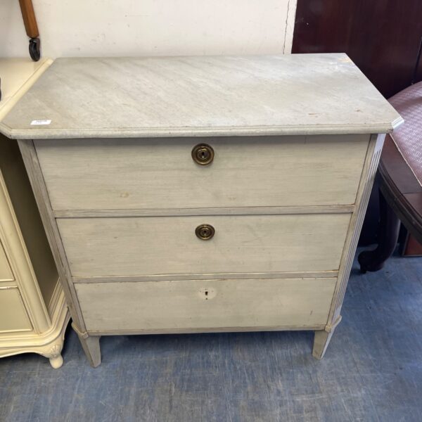 Antique Gustavian chest of drawers with a soft vert finish and aged hardware.