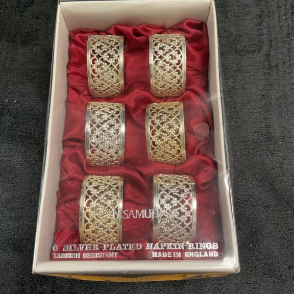 Set of six vintage H Samuel silver plated napkin rings.