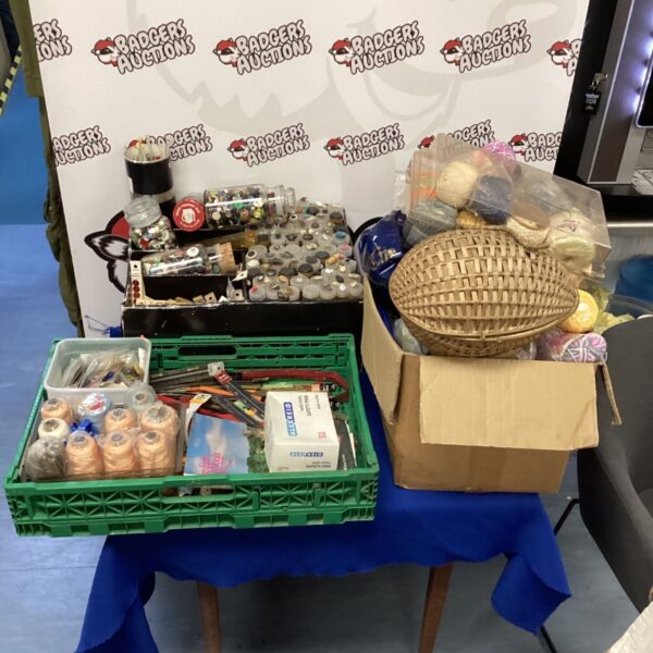 Large haberdashery lot with buttons, thread, and sewing supplies.