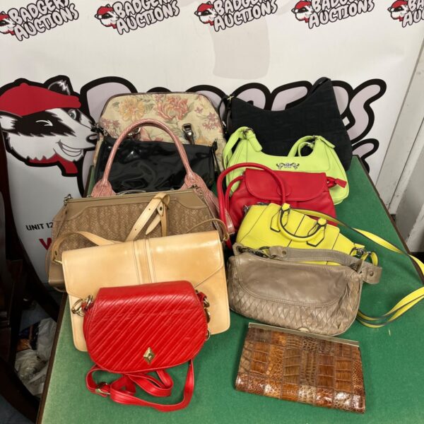 Job lot of colourful vintage handbags and fashion accessories.