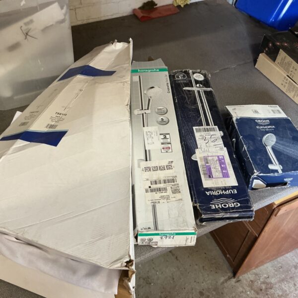 Hansgrohe shower heads job lot with packaging visible.