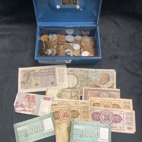 Vintage Helix cash box filled with assorted coins and banknotes.