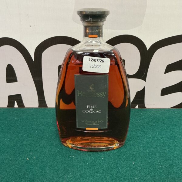 Vintage bottle of Hennessy Fine de Cognac, a collectible French brandy.