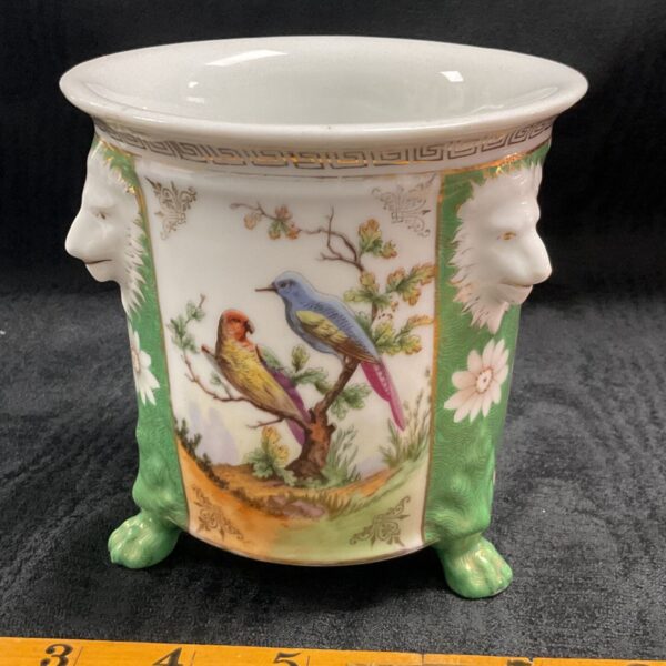 Herend Rothschild bird vase with face details and vibrant painting.
