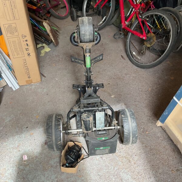 Hill Billy electric golf trolley with battery and charger, untested condition.