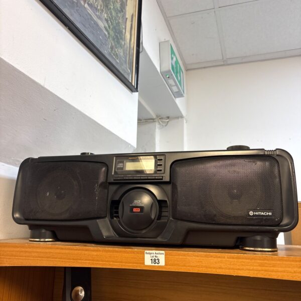 Vintage Hitachi CX-W700E radio cassette recorder, a classic boombox.