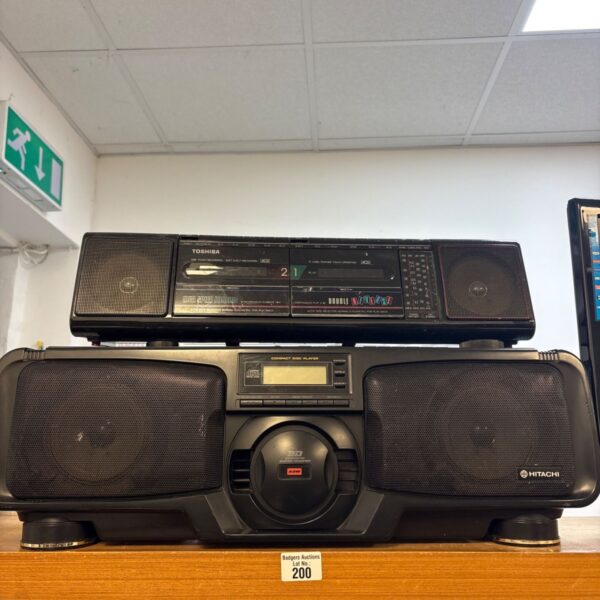 Vintage Hitachi Toshiba radiocassette recorder with stereo display.