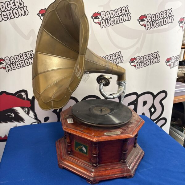 Vintage HMV gramophone with large horn, a classic antique record player.
