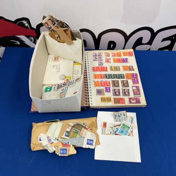 Hong Kong stamp collection in album and loose, vintage philately.
