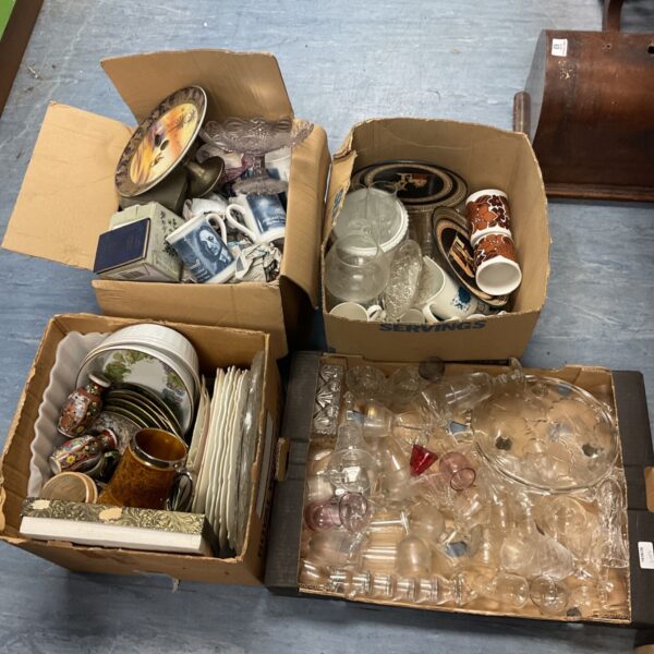 House clearance lot with boxes of mixed items, including cut glass and crystal.