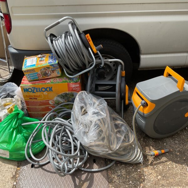 Hozelock auto reel and garden hose lot from a B&Q returns pallet.