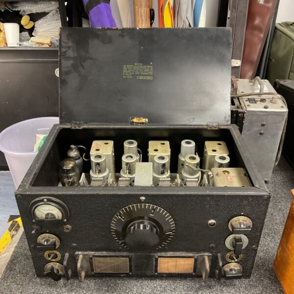 Vintage Collins HRO receiver with open lid showing internal valves.