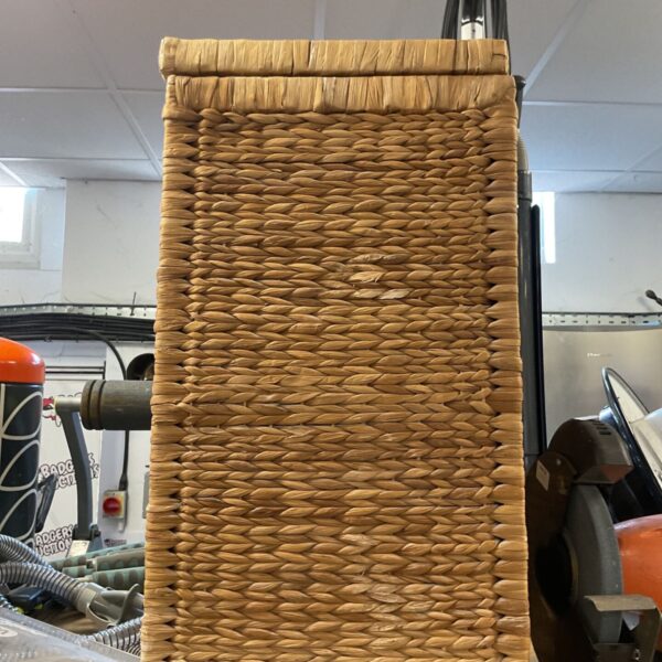Tall woven hyacinth laundry basket for farmhouse style storage.