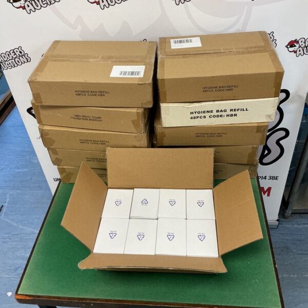Eleven boxes of hygiene bag refills, code HBR, stacked together.