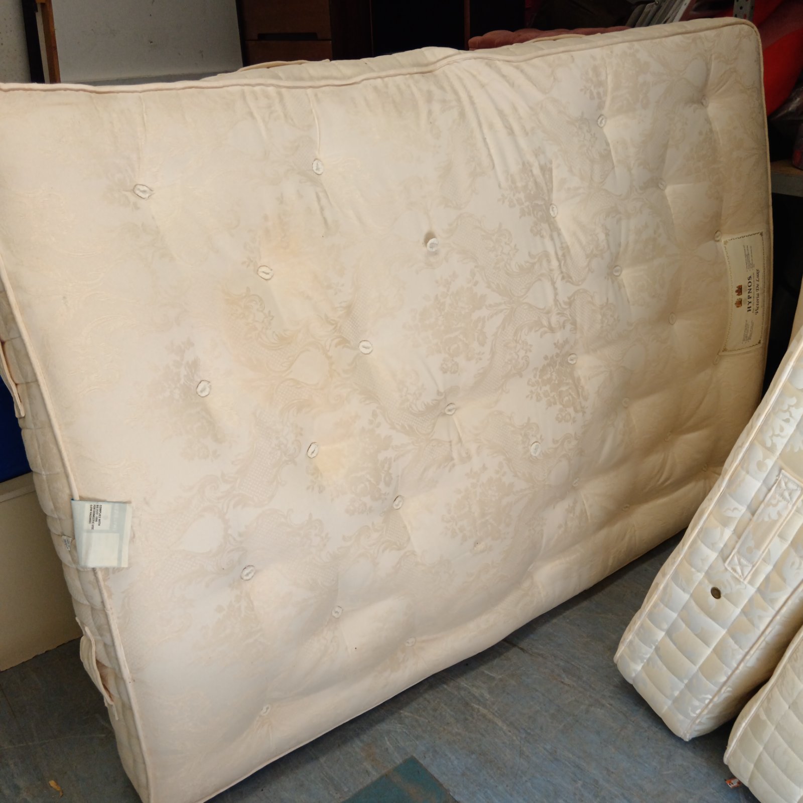 Hypnos Victoria Deluxe double mattress, showing signs of wear.
