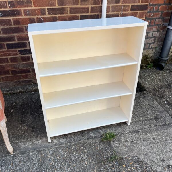 White IKEA BILLY bookcase for home storage.