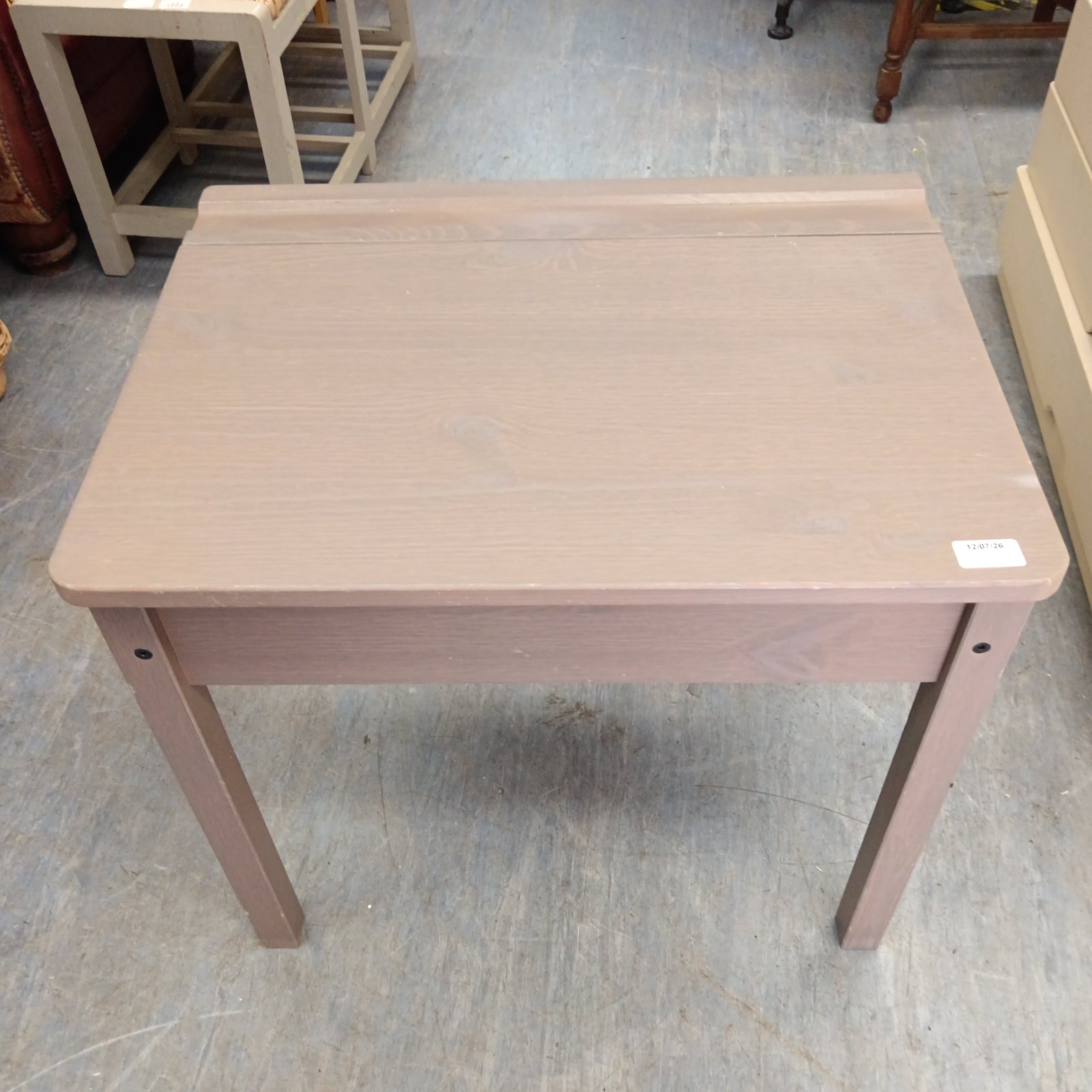 IKEA Sundvik child's desk in neutral wood finish.