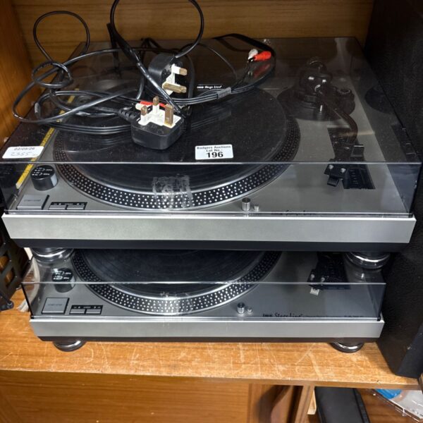 Vintage IMG direct drive turntable model DJP-202/SI for vinyl playback.
