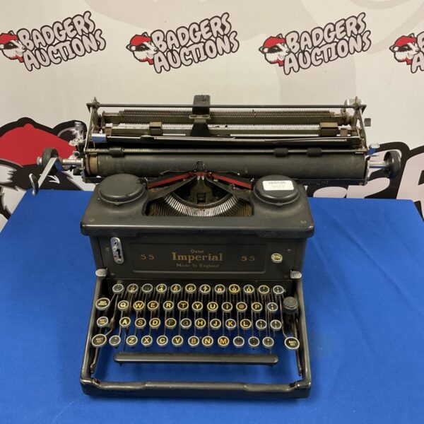 Vintage Imperial Quiet 55 typewriter, a collectible mechanical machine.