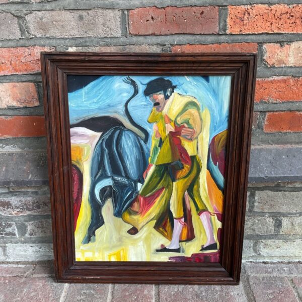 Vibrant impressionist oil painting of a matador and bull.