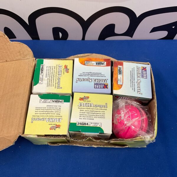 Box of vintage Jagha cricket balls for cricket enthusiasts.