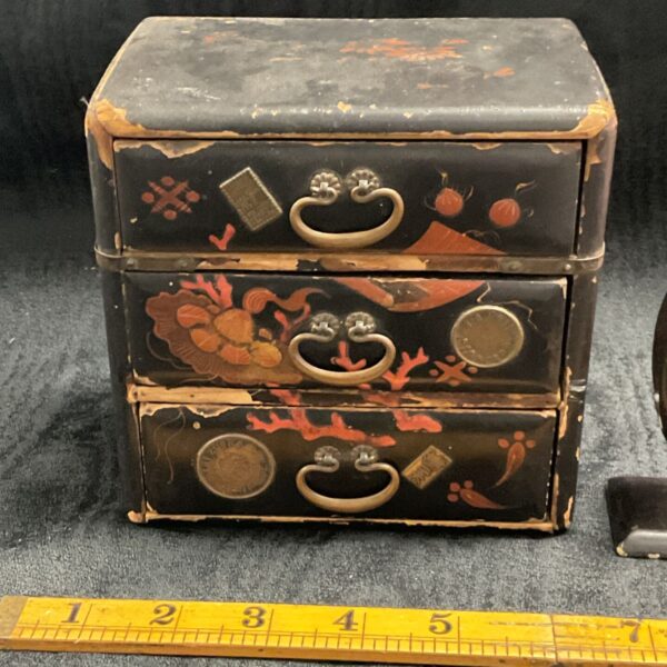 Antique Japanese lacquer jewellery cabinet with three drawers.