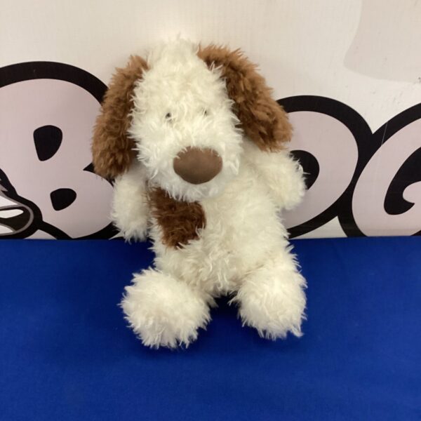 Cream and brown Jellycat dog plush toy.
