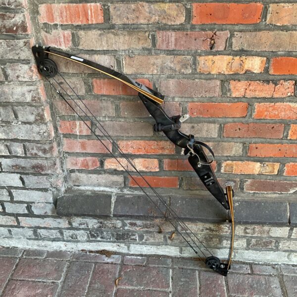 Vintage Jennings Starlite compound bow for archery enthusiasts.