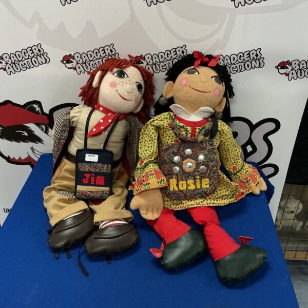 Vintage Jim and Rosie dolls, a charming pair of folk art collectibles.