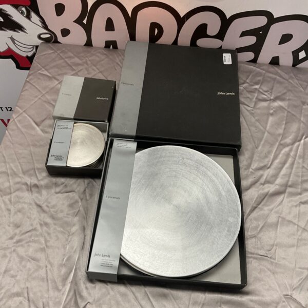 John Lewis placemats and coasters set on a surface.