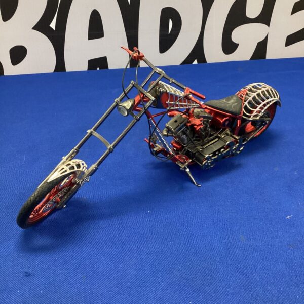 Orange Joyride Spiderman chopper diecast motorcycle collectible.