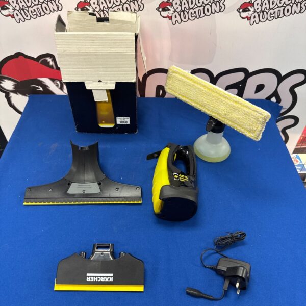Karcher WV anniversary window vacuum with charger and accessories.