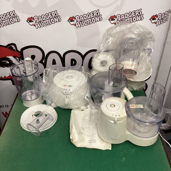 White Kenwood FP580 food processor with attachments for kitchen use.