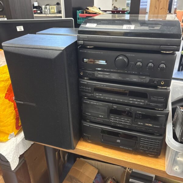Black Kenwood hifi system with multiple components and speakers.