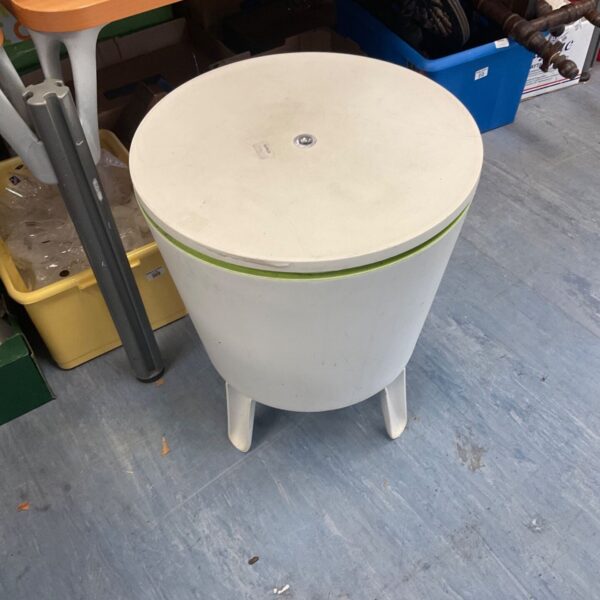 Bright blue Keter Cool Bar plastic ice bucket for outdoor use.