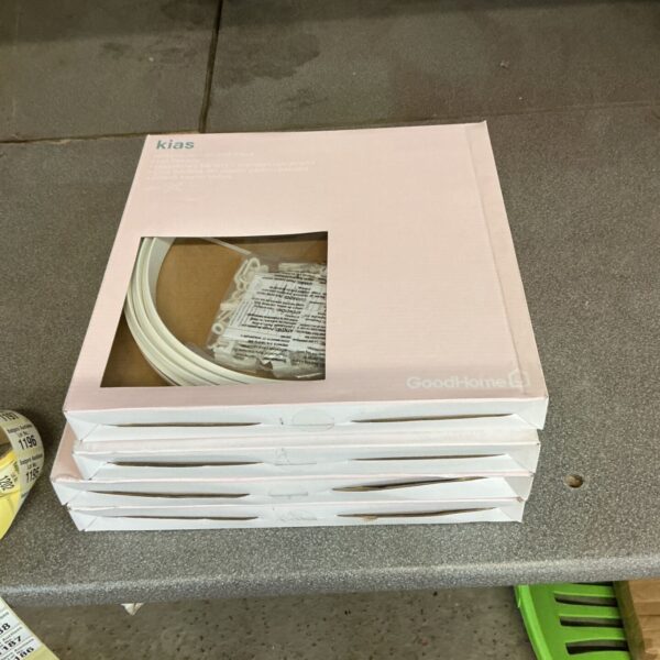Four packs of Kias curtain coil racks, model 1196, in original packaging.
