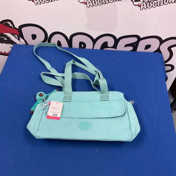 New teal Kipling shoulder bag, a stylish and practical accessory.