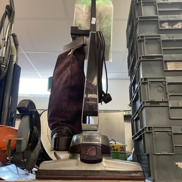 Vintage Kirby G5 upright vacuum cleaner in used condition.